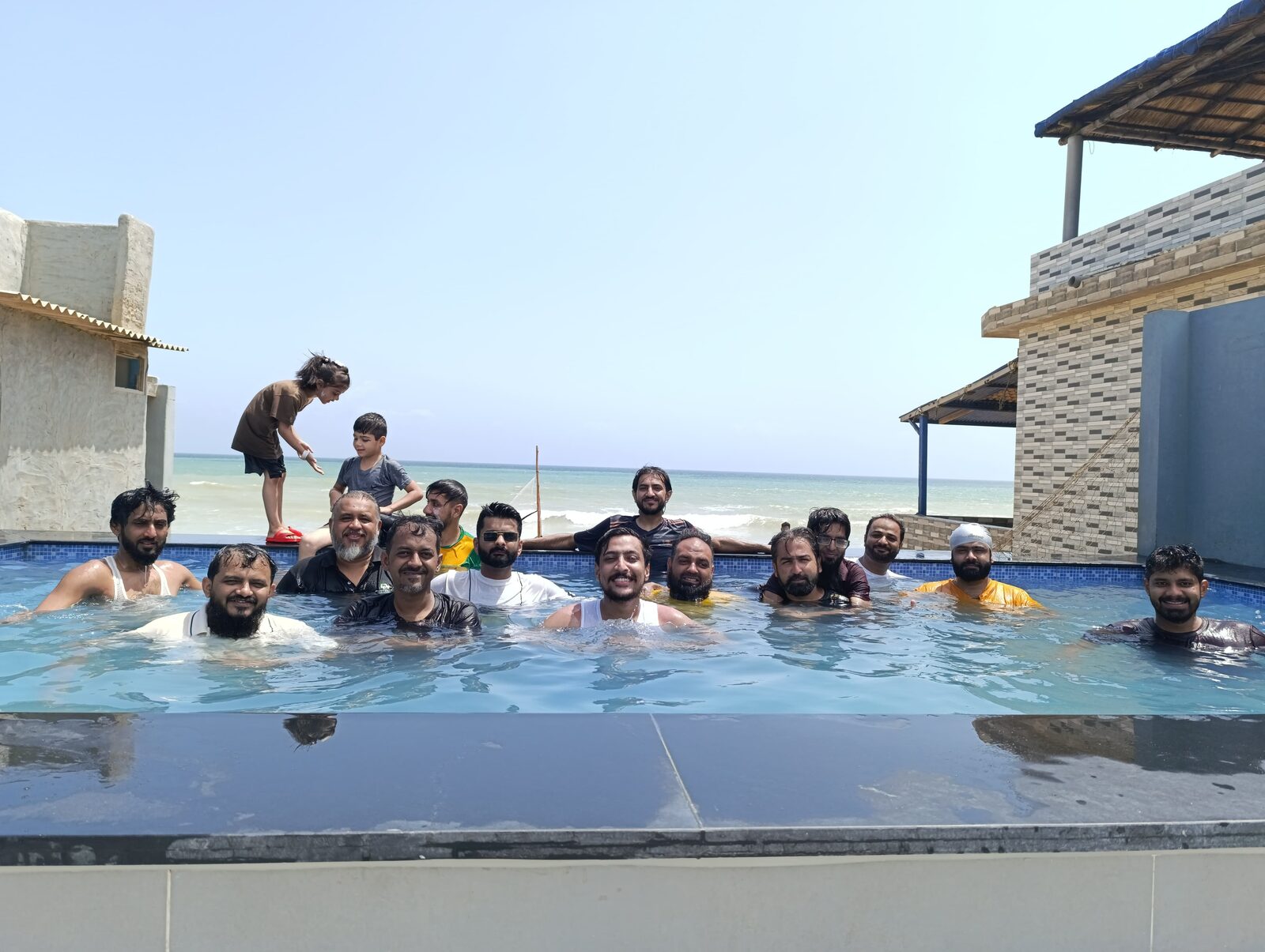 Deliverydevs picnic 2024: the team together in the pool