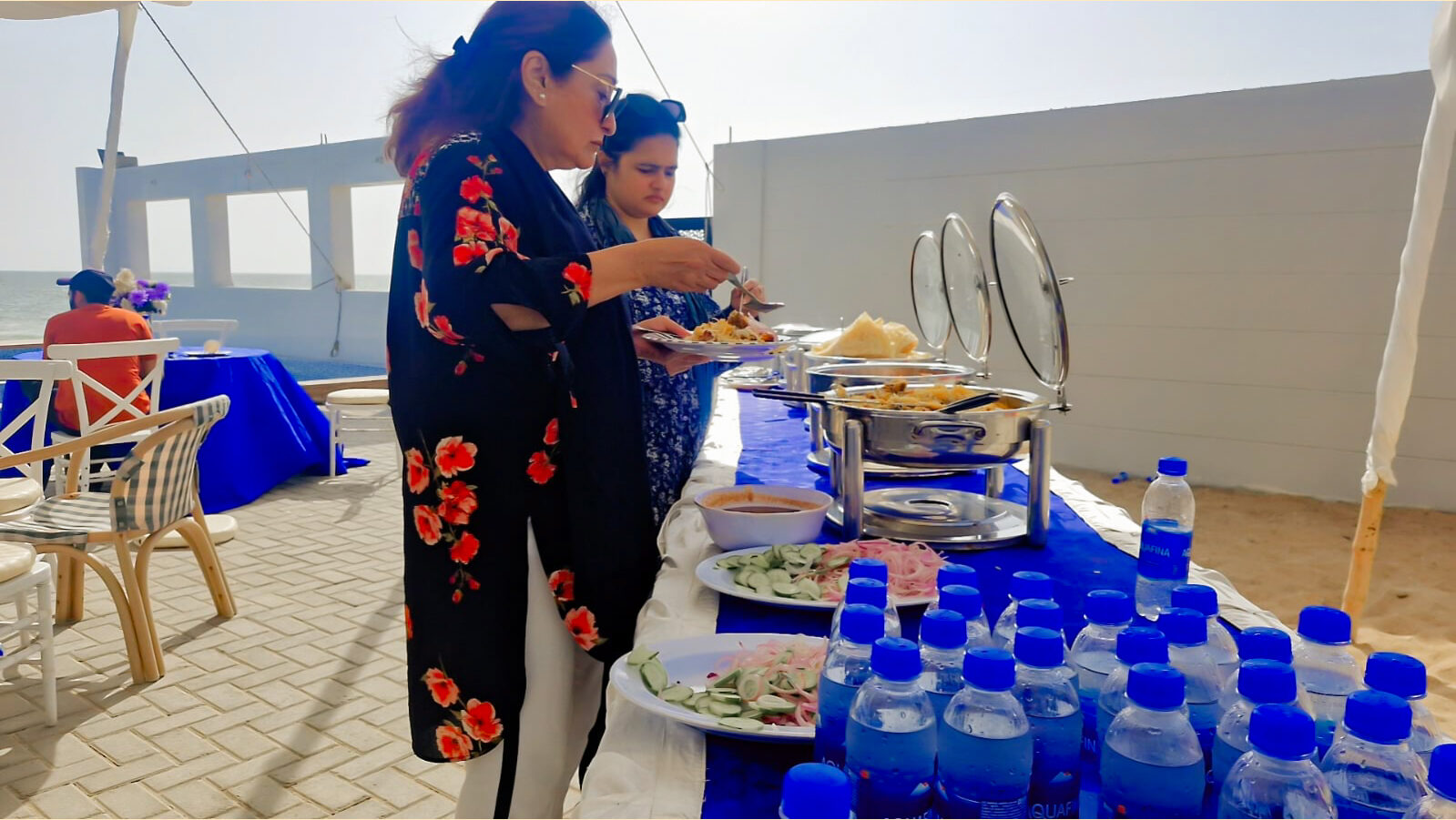Deliverydevs picnic 2025: the team helping themselves at the buffet